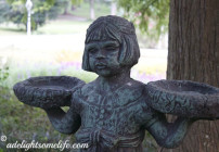 close up tall Bird Girl Statue adelightsomelife.com